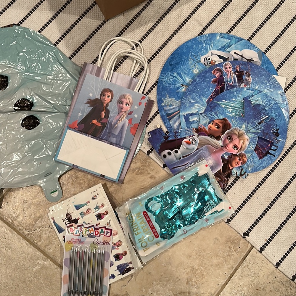 Disney Frozen Party decor (foil balloons, dessert tower, foil fringe + more)